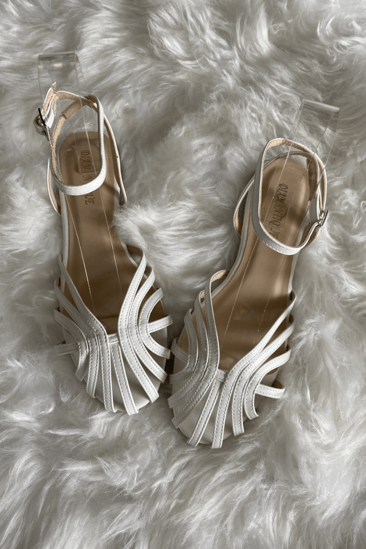 SOLE | Elegant woven flat sandals for a sophisticated look